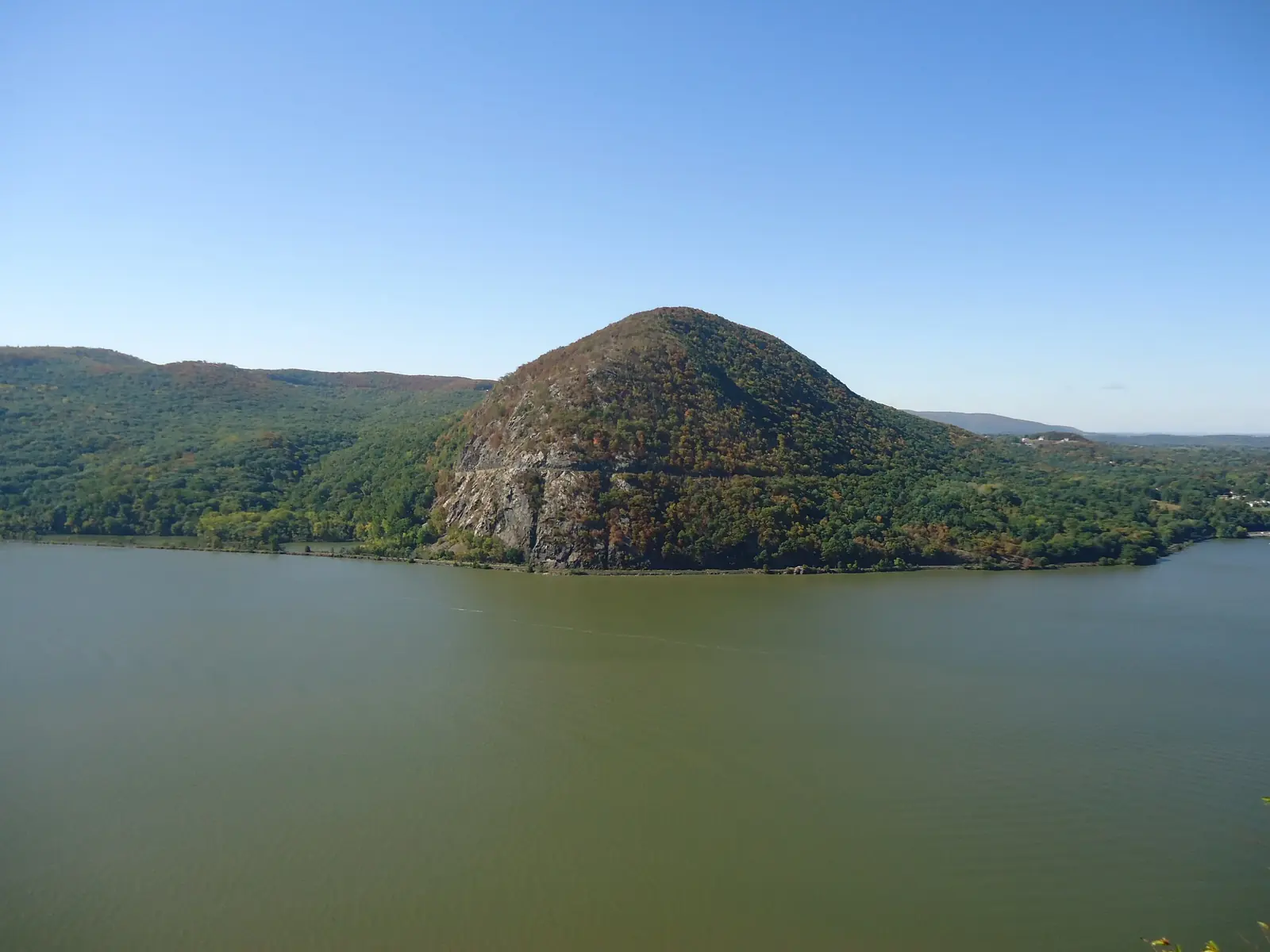 Storm King Mountain rising over the Hudson River near Cornwall, Orange County